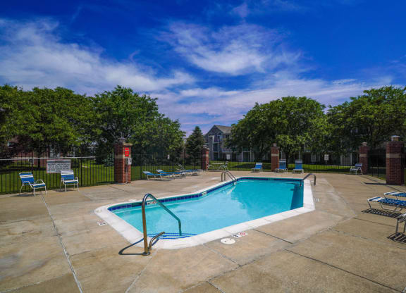 Refreshing pool and large sundeck with free Wi Fi at Foxwood and The Hermitage, Portage, Michigan