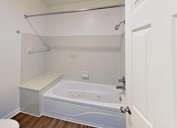 A master bathroom with a whirlpool tub at Foxwood and The Hermitage, Michigan, 49024