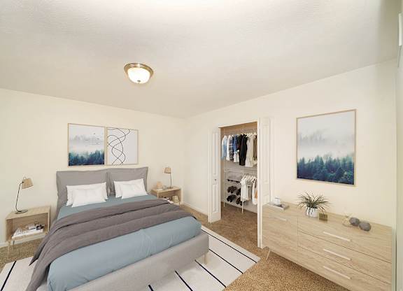 a bedroom with a bed and a walk-in closet at Foxwood and The Hermitage, Portage