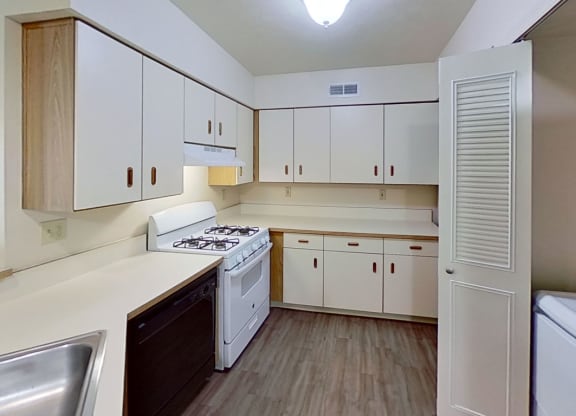 Kitchen with Dishwasher at The Highlands Apartments, Indiana
