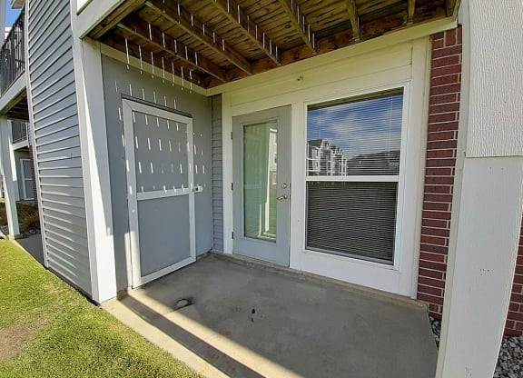 French Door to Private Patio at Hunters Pond Apartment Homes in Champaign, IL