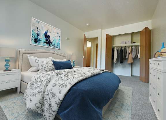 Bedroom with Large Closet Large Closets with Organizers at Huntington Place Apartments, Essexville, MI, 48732