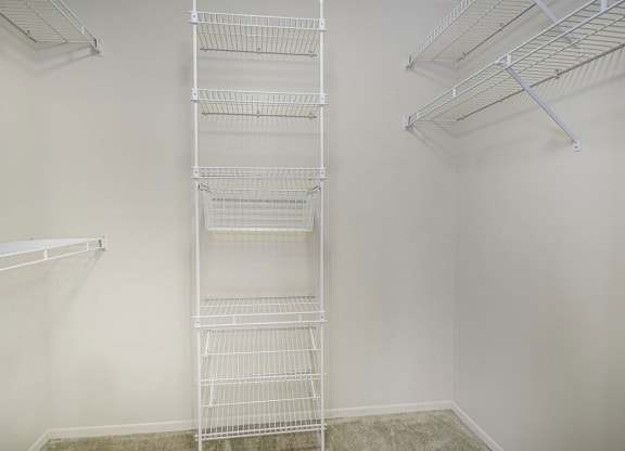 a white closet with wire shelving on the wall at Indian Lakes Apartments, Indiana, 46545
