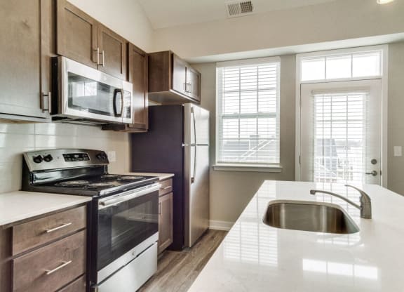 Kitchen (Hickory) at Village Place Apartments, Romeoville, 60446