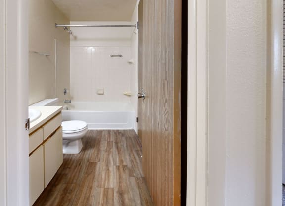 first bathroom with a bathtub/shower combination at Irish Hills Apartments, South Bend, 46614