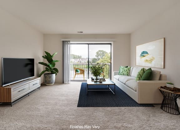 a living room with a couch and coffee table at The Landings Apartments, Westland, MI