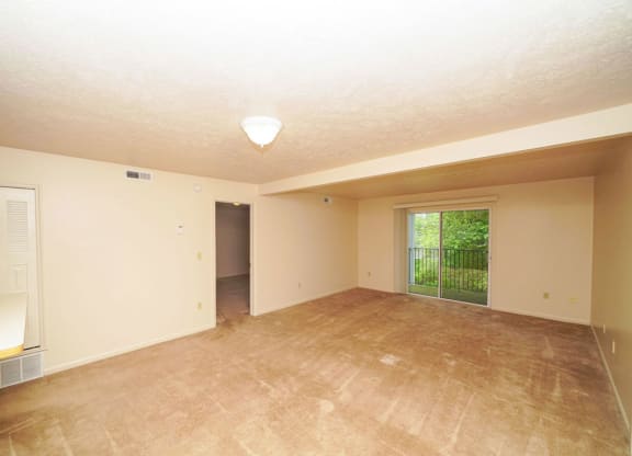 the living room and dining room of a two bedroom apartment at Liberty Mills Apartments, Fort Wayne