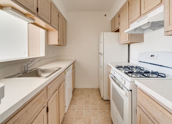 Lily Layout Model White Kitchen Appliances at The Harbours Apartments, 48038