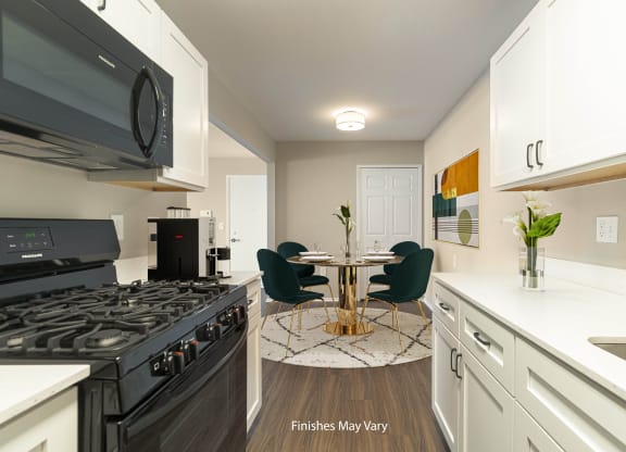 Magnolia Renovated Kitchen Dining with Vinyl at Bristol Square and Golden Gate Apartments in Wixom, MI