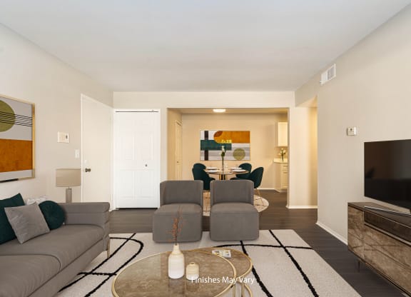 Magnolia Renovated Living Area with Vinyl at Bristol Square and Golden Gate Apartments in Wixom, MI