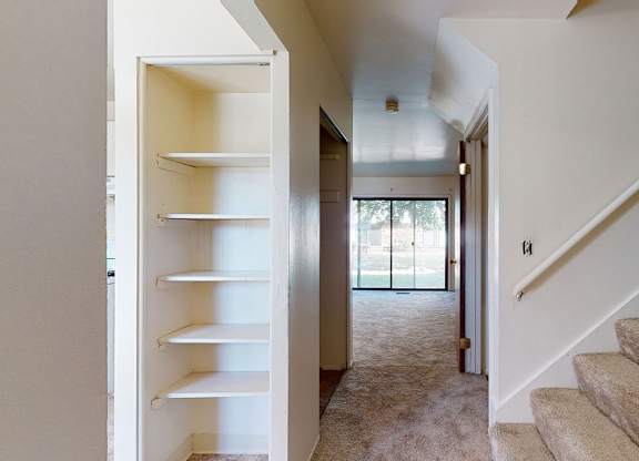 An entryway leading to sliding glass doors to a patio at Mount Royal Townhomes, Kalamazoo, MI