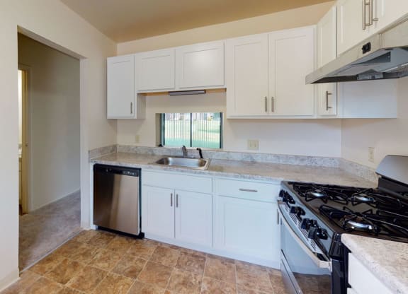 Renovated Kitchen with White Cabinets at Mount Royal Townhomes, Michigan