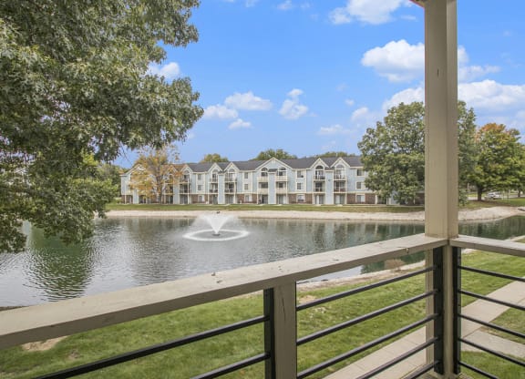 private balcony with a pond view at North Pointe Apartments in Elkhart, IN