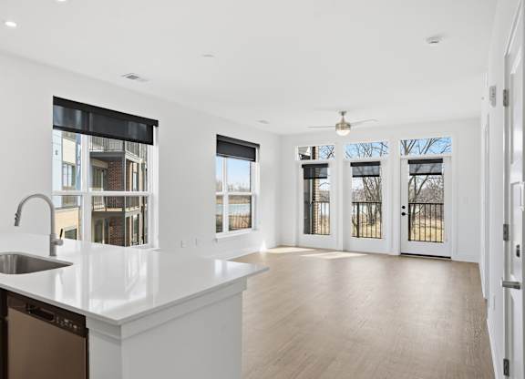 A kitchen with a sink and a window at Nuvo Flats, Indiana, 46410