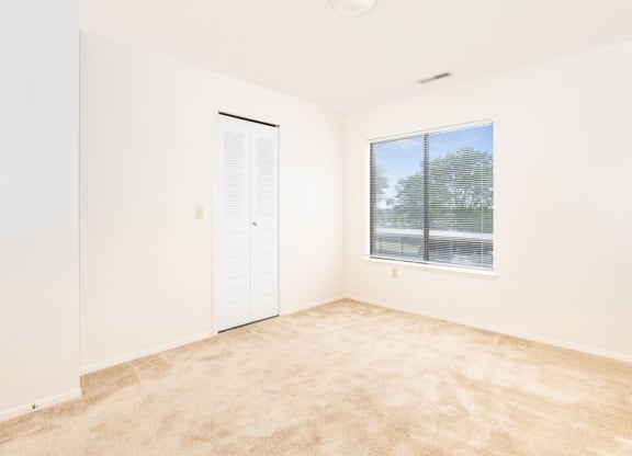 Spacious Bedroom with Large Closet at Oak Shores Apartments in Oak Creek, WI