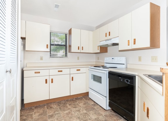 End Kitchen with Window at Oak Shores Apartments in Oak Creek, WI