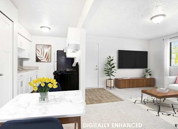 A modern kitchen, dining and living room with a large window at Old Farm Apartments, Elkhart, Indiana