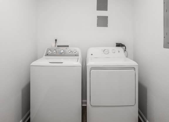 In-unit washer/dryer set in Greenwood Apartments at Polo Run Apartments, Greenwood