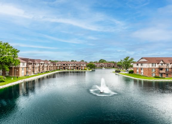 a fountain in the middle of a pond at Scarborough Lake Apartments, Indiana, 46254