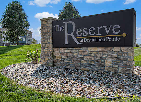 A sign that says The Reserve at Destination Pointe at The Reserve at Destination Pointe, Grimes, Iowa