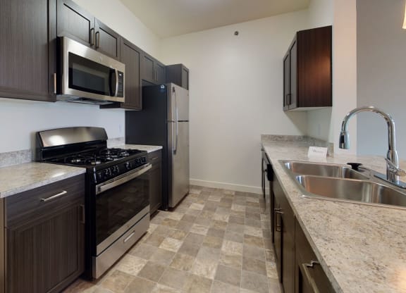 Two Bedroom Kitchen at The Reserve at Destination Pointe in Grimes, IA with