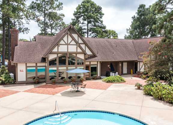 A house with a pool in the backyard at Lake in the Pines, North Carolina, 28311