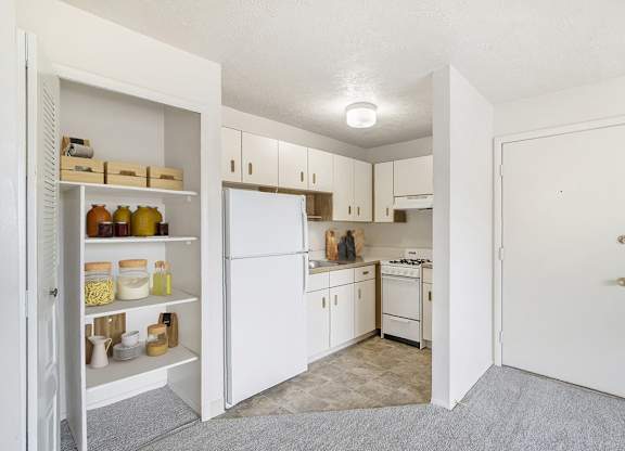 studio kitchen with ample closet space at Seville Apartments in Kalamazoo, MI 49009