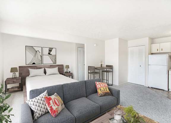a living room leading to the kitchen at Seville Apartments in Kalamazoo, MI 49009