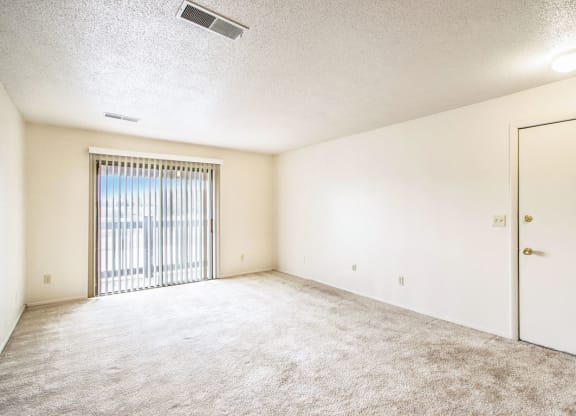 Carpeted Living Room at Seville Apartments, Michigan