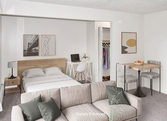 a living room with a sleeping area at Seville Apartments, Kalamazoo, 49009