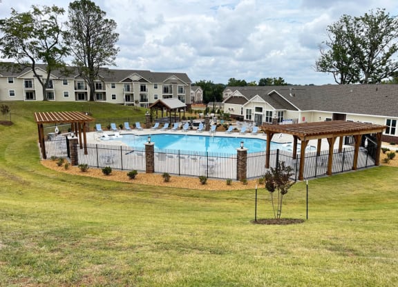 our apartments showcase an unique swimming pool  at Signature Pointe Apartment Homes, Athens, 35611