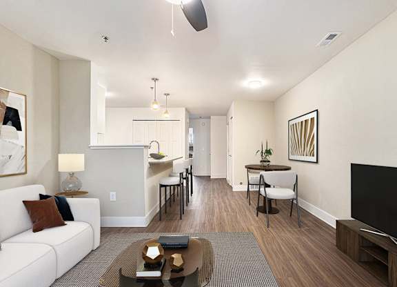 open floor plan with kitchen breakfast bar at Signature Pointe Apartment Homes in Athens, AL
