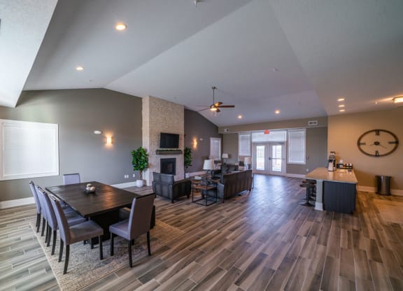 Clubroom With Smart Tv And Fireplace at Strathmore Apartment Homes, Iowa