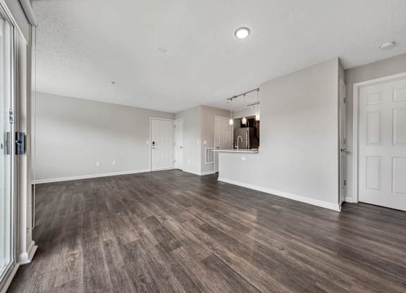 A room with wooden floors and white walls. at Sunscape Apartments, Roanoke, VA, 24018