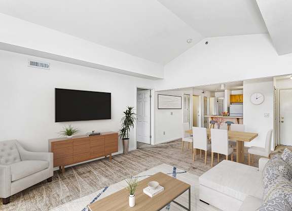 a dining room with a high ceiling at Tall Oaks Apartment Homes, Michigan