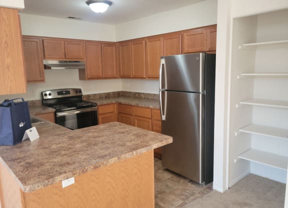 Kitchen with Pantry at Tanglewood Apartments, Wisconsin 53154