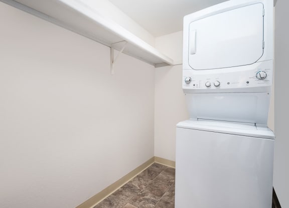 a stackable washer and dryer at Tanglewood Apartments, Wisconsin, 53154