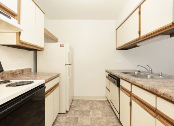 Galley-Style Kitchen at Tanglewood Apartments, Oak Creek