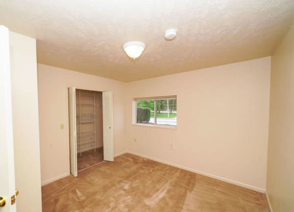 Bedroom with Walk In Closet at The Highlands Apartments in Elkhart, IN