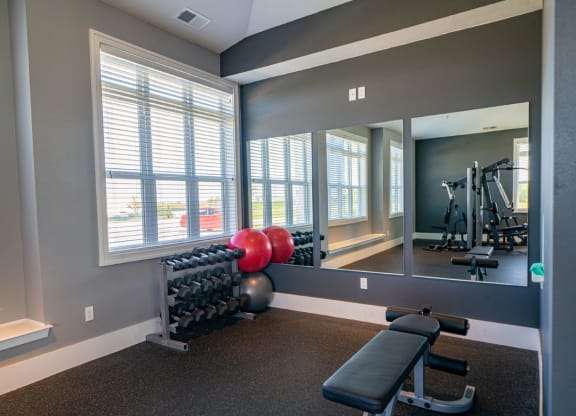 Free Weights In Gym at The Reserve at Destination Pointe, Iowa, 50111