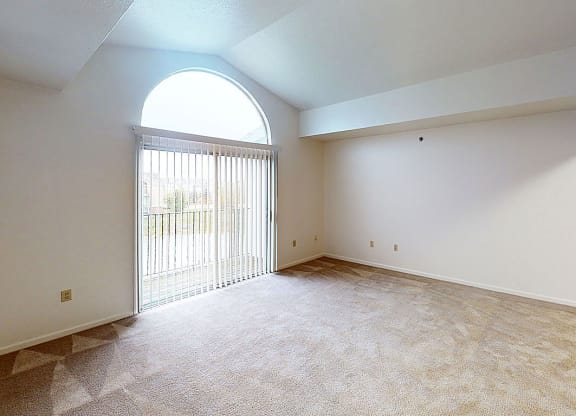 two bedroom living room with a cathedral ceiling  at Tracy Creek Apartment Homes, Perrysburg