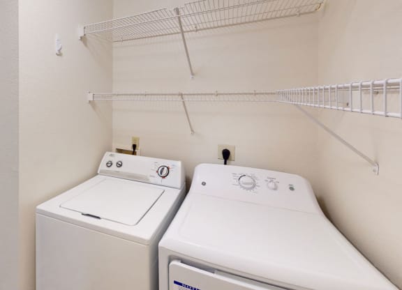 a washer at Tracy Creek Apartment Homes, Perrysburg, OH, 43551