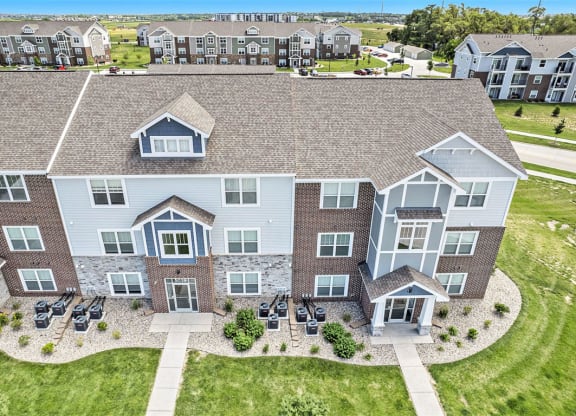 an aerial view of buildings at Trade Winds Apartment Homes in Elkhorn, NE 68022