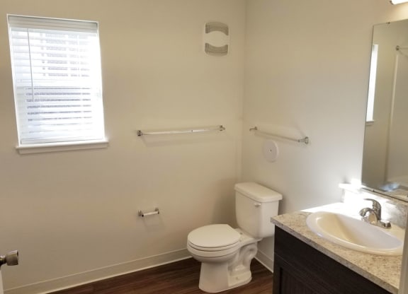Bathroom with Hard Surface Flooring at Trade Winds Apartment Homes in Elkhorn, NE