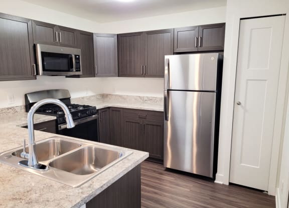 One Bedroom Modern Kitchen with Pantry at Trade Winds Apartment Homes, Elkhorn, NE