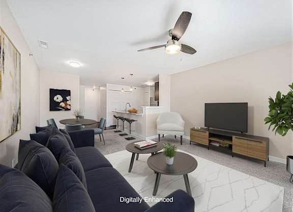 living room with a ceiling fan at Trade Winds Apartment Homes, Elkhorn, Nebraska