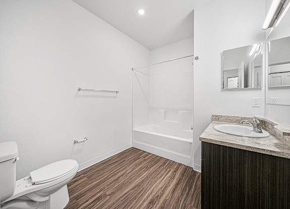 main bathroom with hard surface flooring at Trade Winds Apartment Homes, Elkhorn, NE