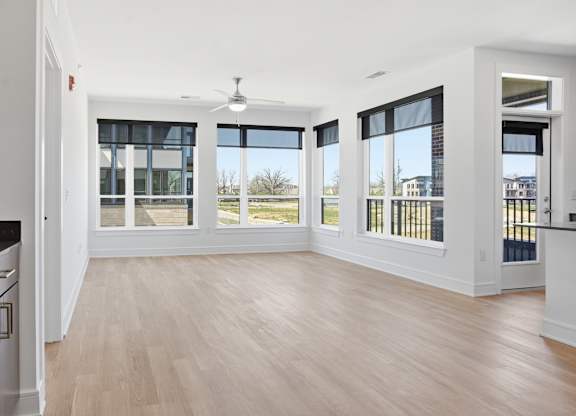 A kitchen with a black countertop and wooden floors at Upper Vue Flats, Dublin