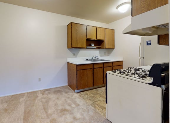 kitchen with a dining area at Walnut Trail Apartments in Portage, MI 49002