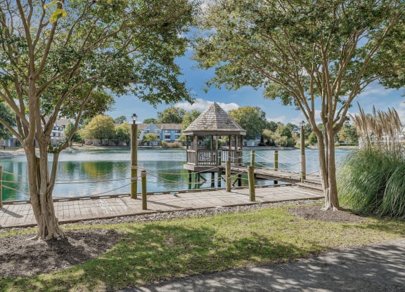 a dock with a gazebo on the water at WaterFront Apartments, Virginia Beach, Virginia